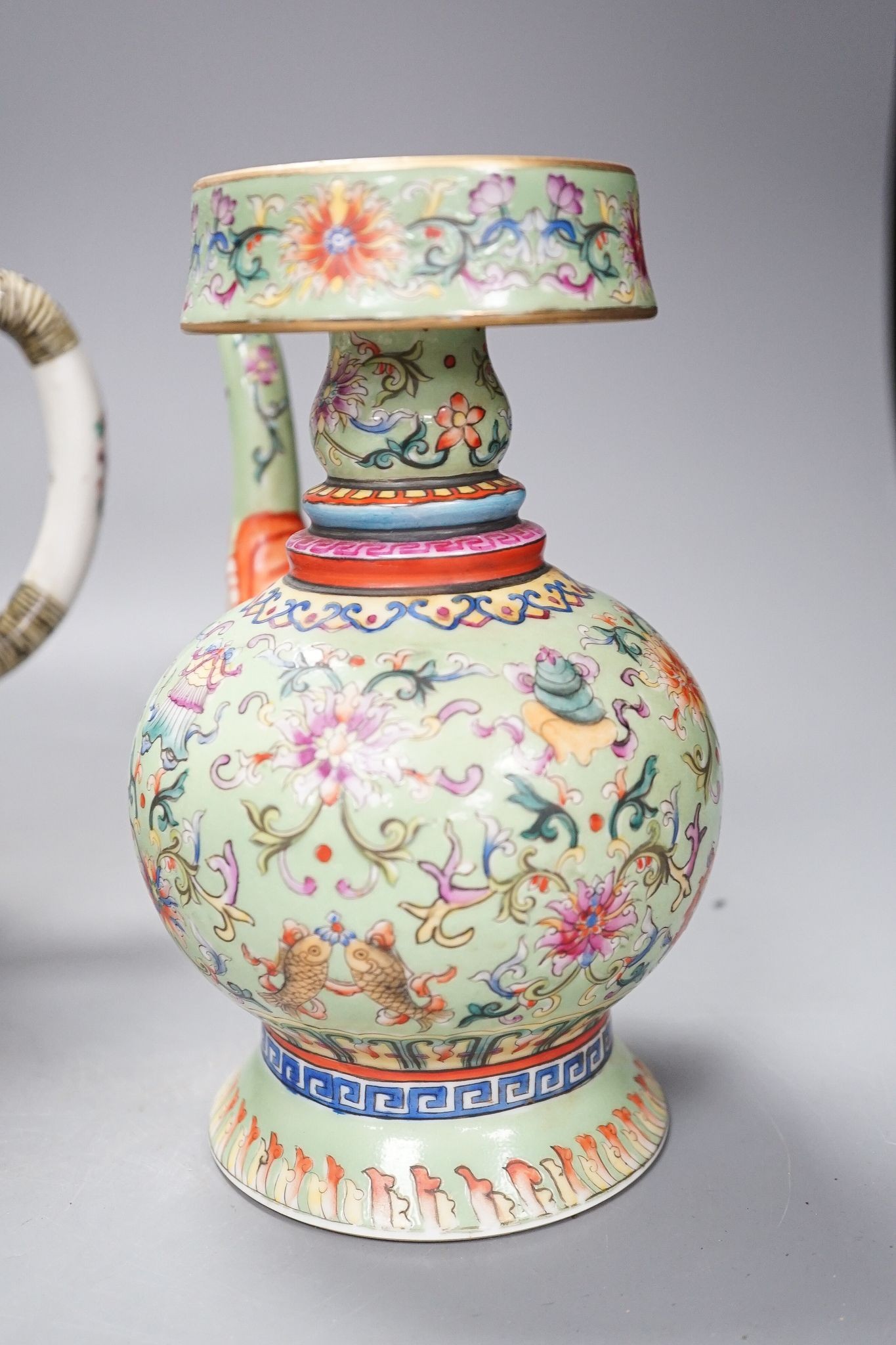 A large 19th century Chinese famille rose wine pot, and another wine pot, tallest 27cm